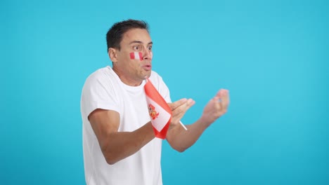Man cheering for Peru, angry with the decision of referee