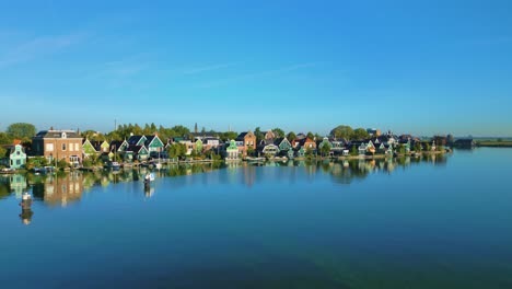 beautifully built houses along the river at the zaanse schans, koog aan de zaan, netherlands