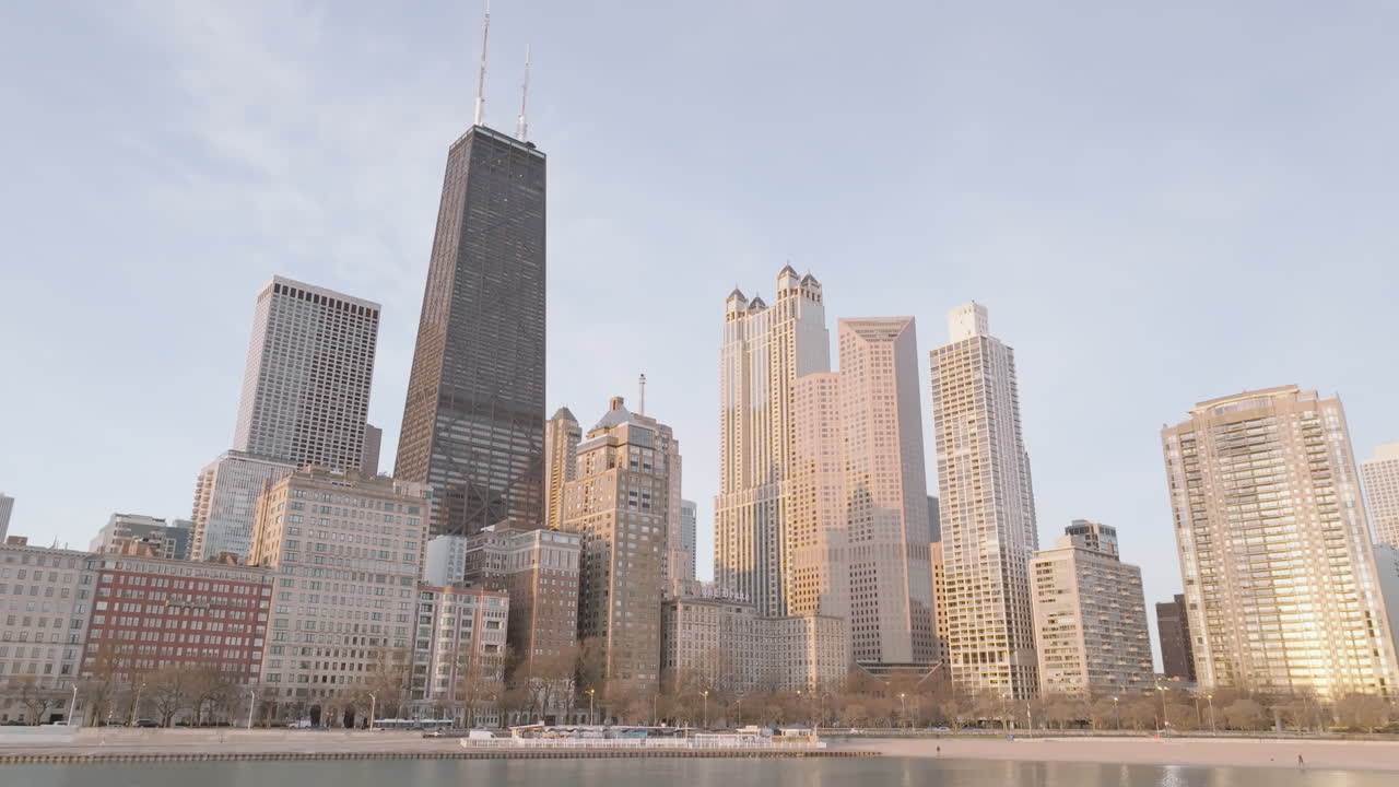 Establishing shot of Chicago at sunrise. Shot on Lake Michigan