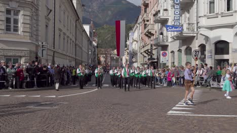 a marching band parade in a european town