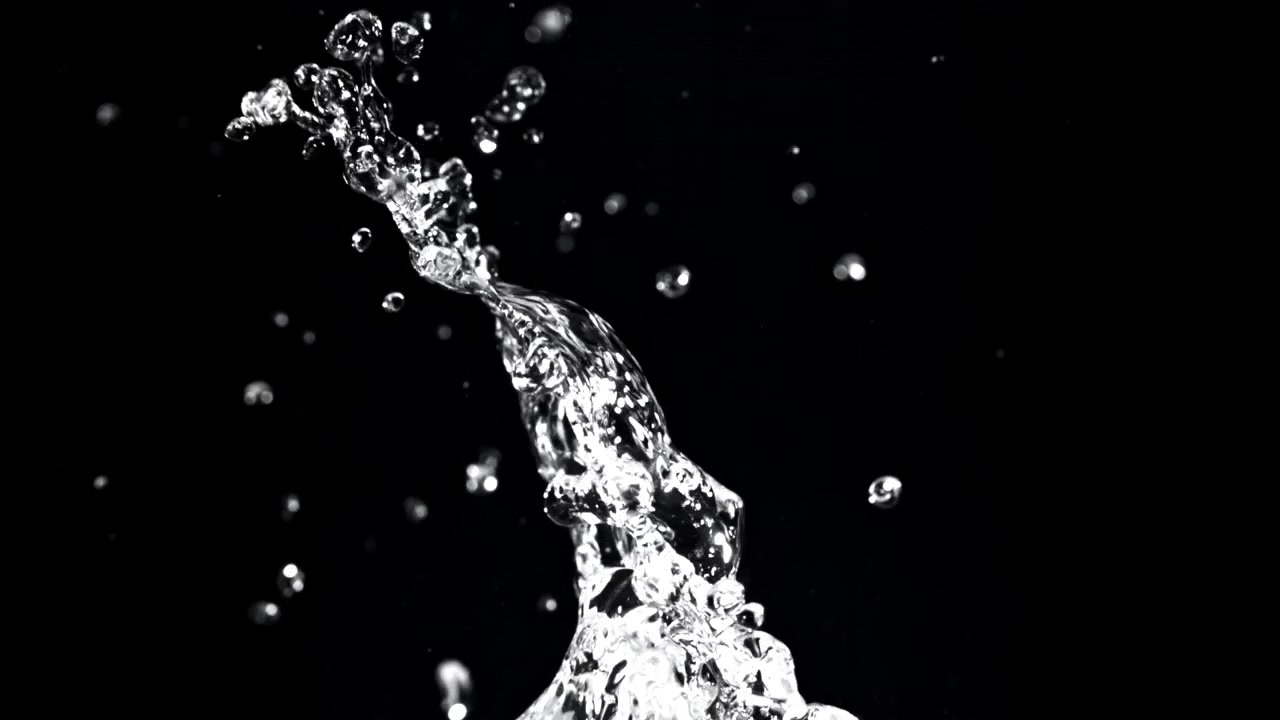 Clear Water Splashing Upwards with Droplets on Black Background