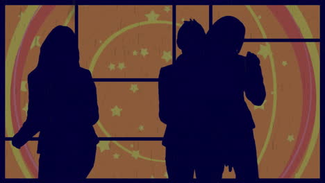 silhouetted people standing with starry night animation in background