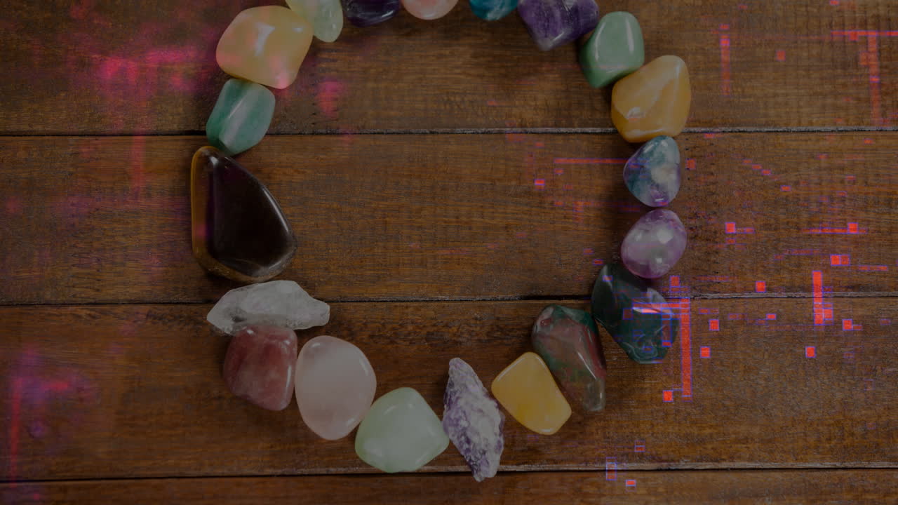 Showcasing open gemstone circle forming on wooden tabletop, highlighting polished colorful stones