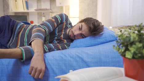 The-young-man-lying-in-his-bed-is-thoughtful.