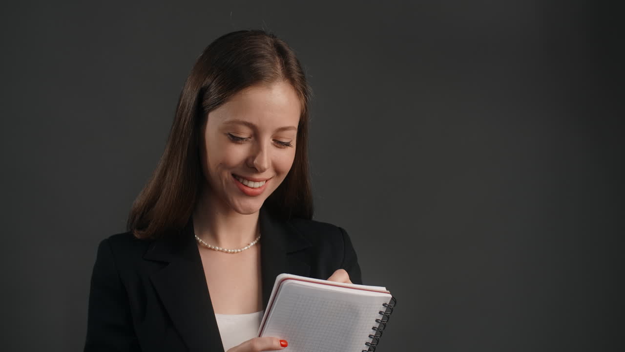 Business Woman Thinking and Taking Notes