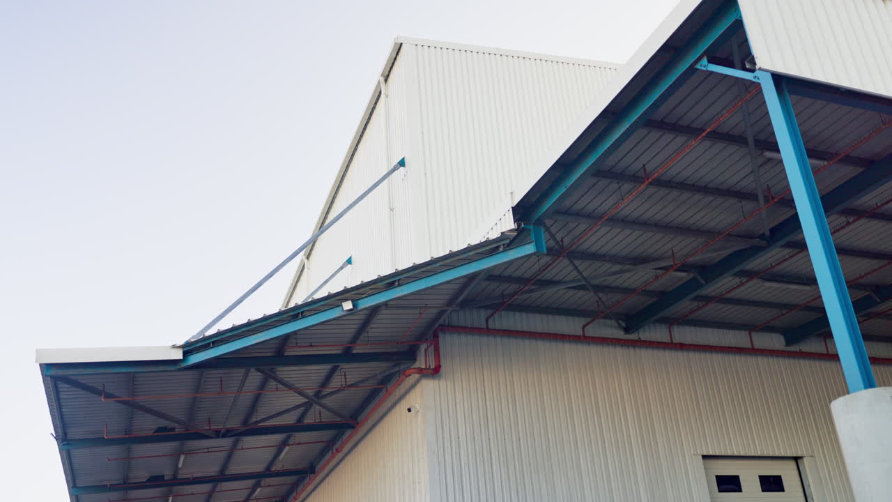 Exterior of a modern industrial building with metal cladding