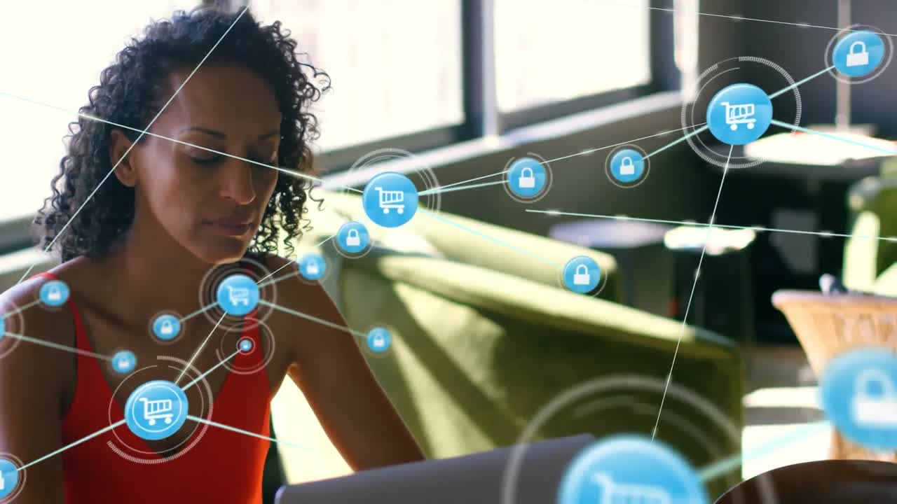 Animation of network of connections with icons over woman using laptop