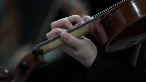 violin musician playing classical music, closeup practicing instrument