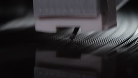 retro vinyl record player playing music, close-up macro shot of vintage lp disc old phonograph spinning. retro music player.