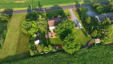 Rural-house-with-beautiful-landscaping-in-summer