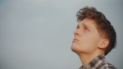 Thoughtful-Male-Farmer-Against-Sky