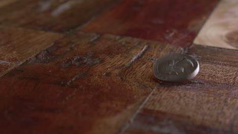 coin is flipped in the air by hand of man in coin toss 12