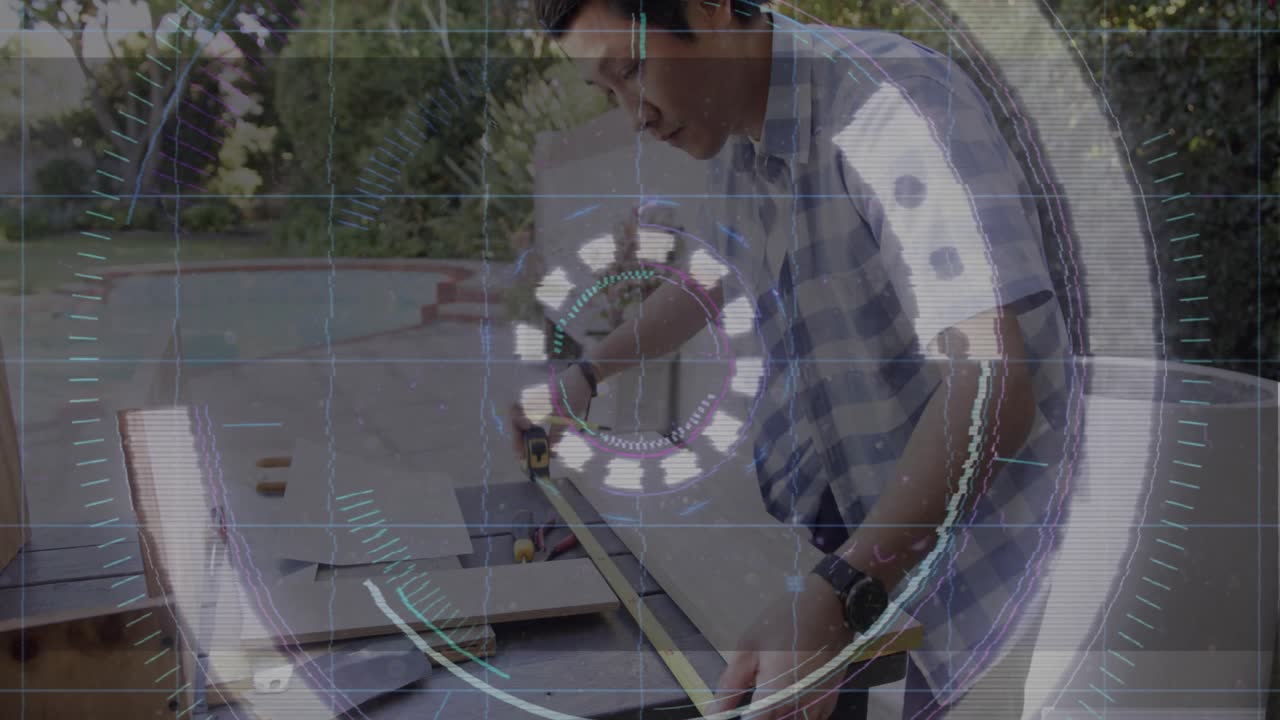 Teenage boy picking up tape measure, measuring, marking wood on patio HUD guiding layout for DIY