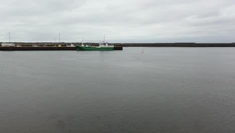 Boat-in-Iceland-Port-Aerial-4K