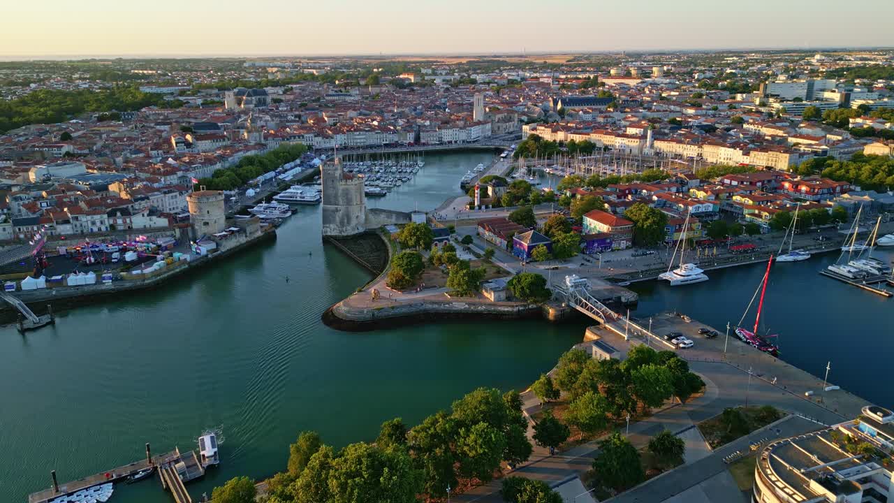 Beautiful forward drone movement to the waterfront La Rochelle city which area intersecting with marina, La Rochelle, Charente-Maritime, France