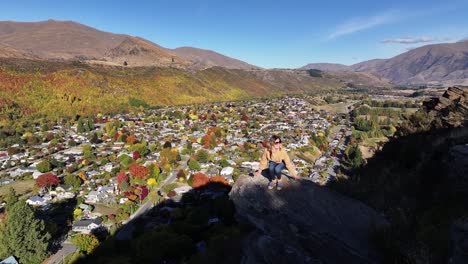 beautiful autumn, fall season scene of young traveler on lookout