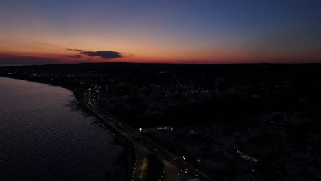 breathtaking 4k aerial sunset over the sea, with vibrant colors painting the sky and water
