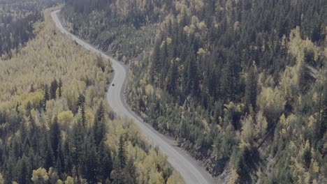 road through autumn: drone capture of cars on highway 24 in fall splendor