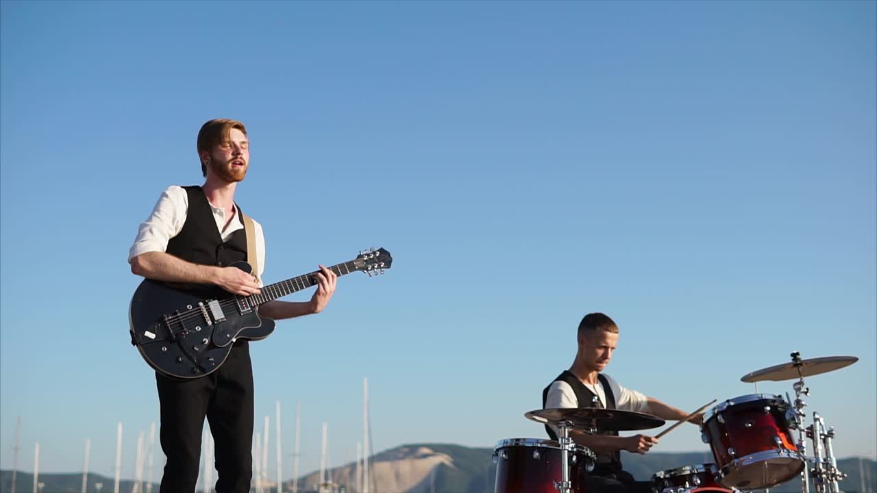 Two Musicians Performing Live Music