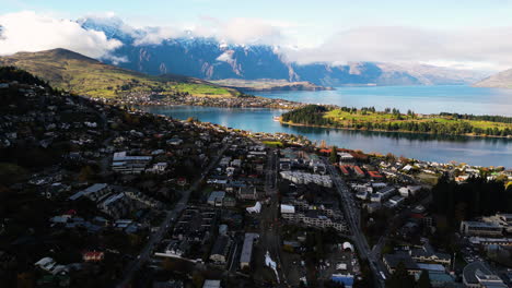 Beautiful-mountain-landscape-across-lake-Wakatipu-in-NZ,-Queenstown,-bird's-eye-view