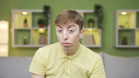 close-up portrait of young man refusing and saying no.