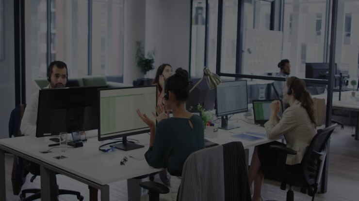 Front woman adjusting headset in office, monitor starting encryption overlay, team securing data