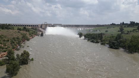 low aerial flies up flooding river downstream from vaal dam release