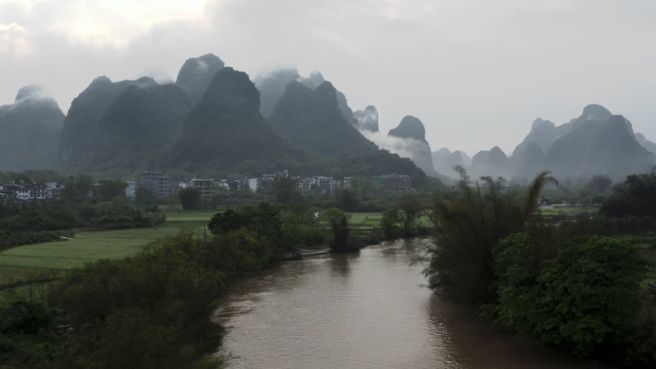 Yulong River flowing through Chinese mountain landscape