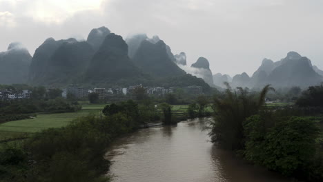 yulong river flowing through chinese mountain landscape