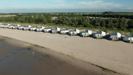 aerial view of holiday houses in row at the beach