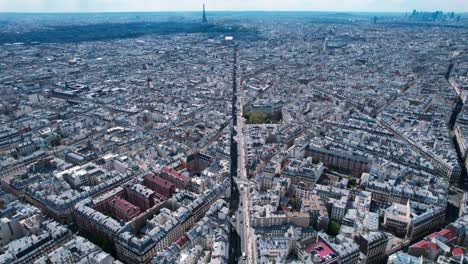 Bird's-aerial-view-of-Paris-cityscape-traffic-street,-rising-up,-France,-day