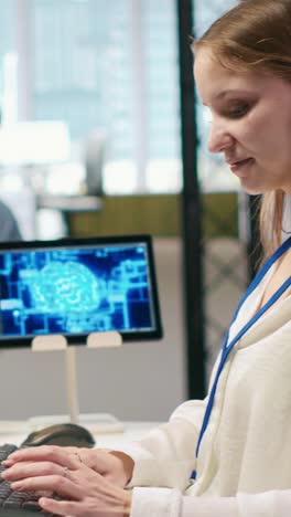 vertical video junior dev in office relies on ai tech to run tasks across multiple devices