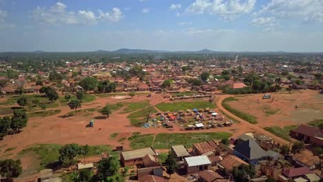 residential houses and local market in luweero town, uganda. - aerial shot