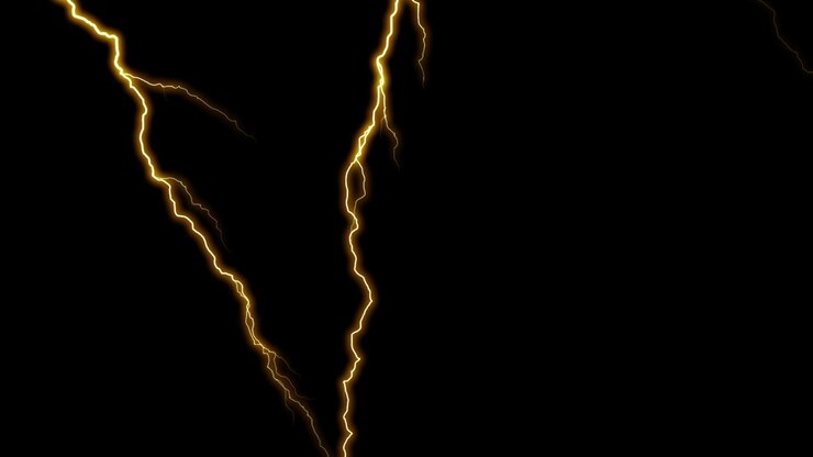 Fulmini dorati che si stagliano su uno sfondo scuro