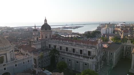 aerial pullback reveals catania duomo in sicily, italy