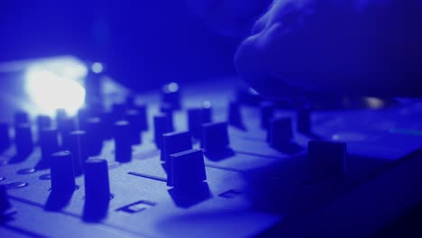 dj mixing at a nightclub