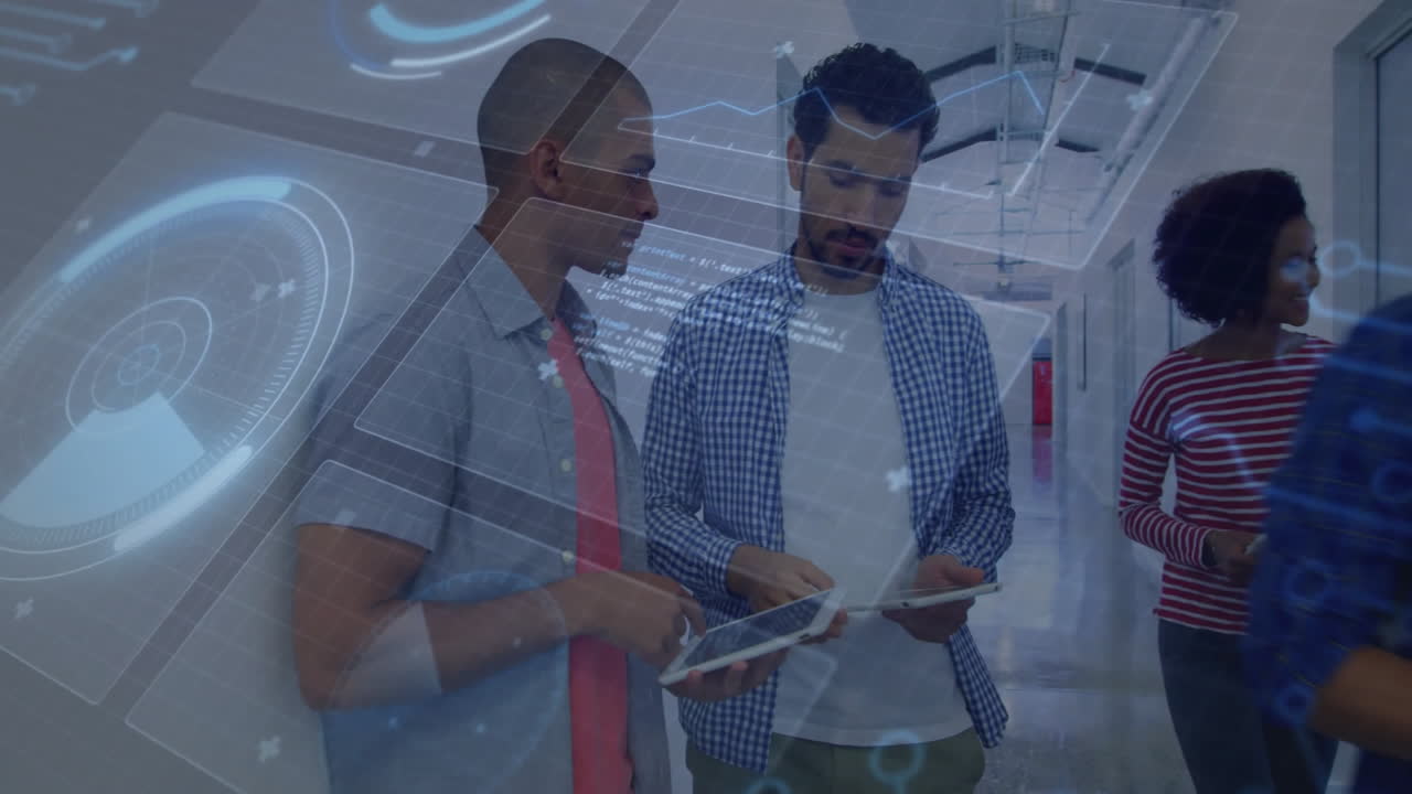 Discussing data processing, diverse colleagues using digital interface in office