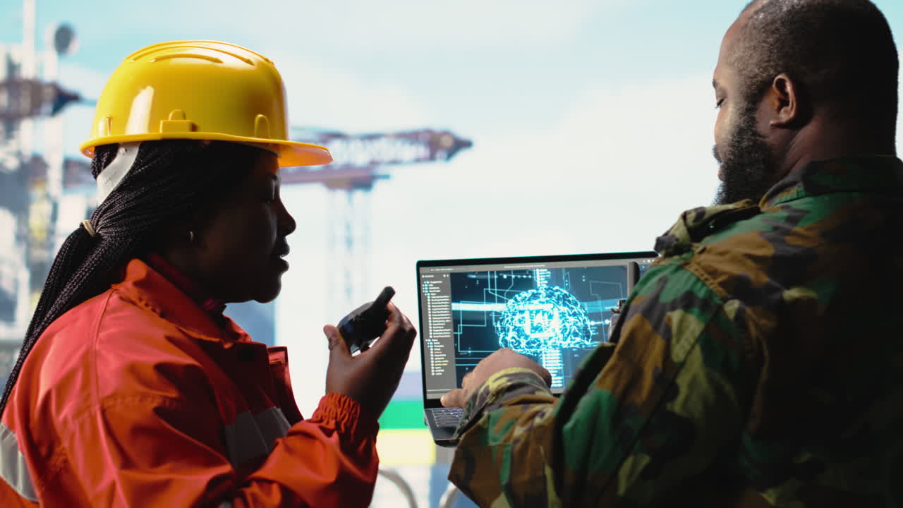 Vertical video Military unit on offshore rig monitoring artificial intelligence defense systems