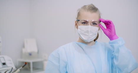 researcher holding covid 19 sample tube in hand 4