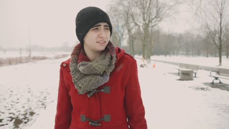 Caucasian-Lesbian-Sightseeing-Snow-Falling-In-Winter-Forest-Park