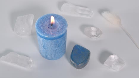 throat chakra candle with lapis lazuli and clear quartz