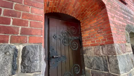 doors with iron fittings leading to an old gothic church