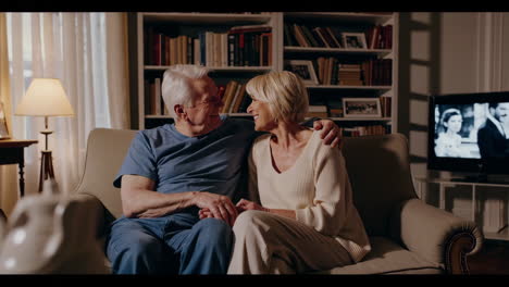 elderly couple relaxing at home