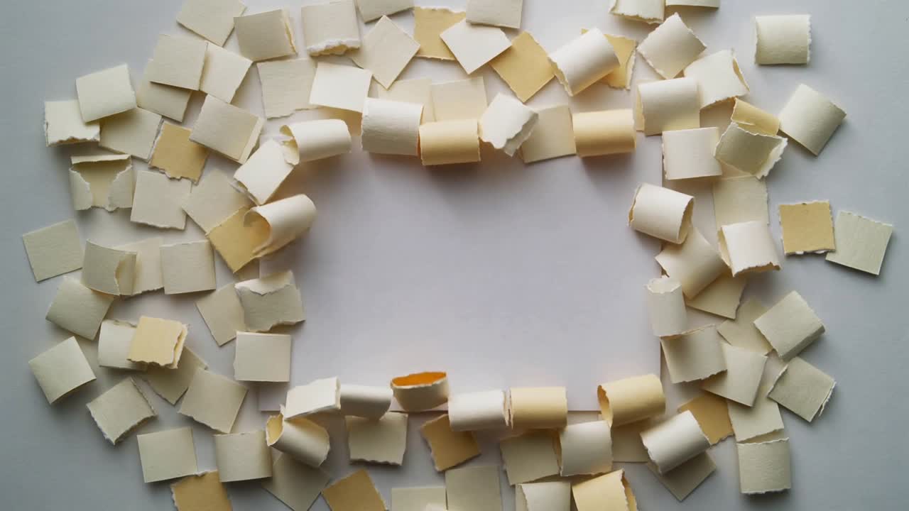 On play torn squares shifting, curling into rolls, migrating inward to cover central sheet overhead