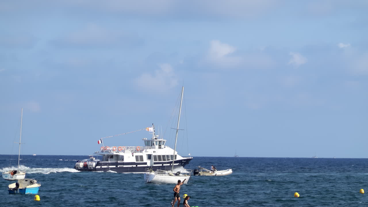 Boats moving on the sea in Golfe-Juan, France in daylight