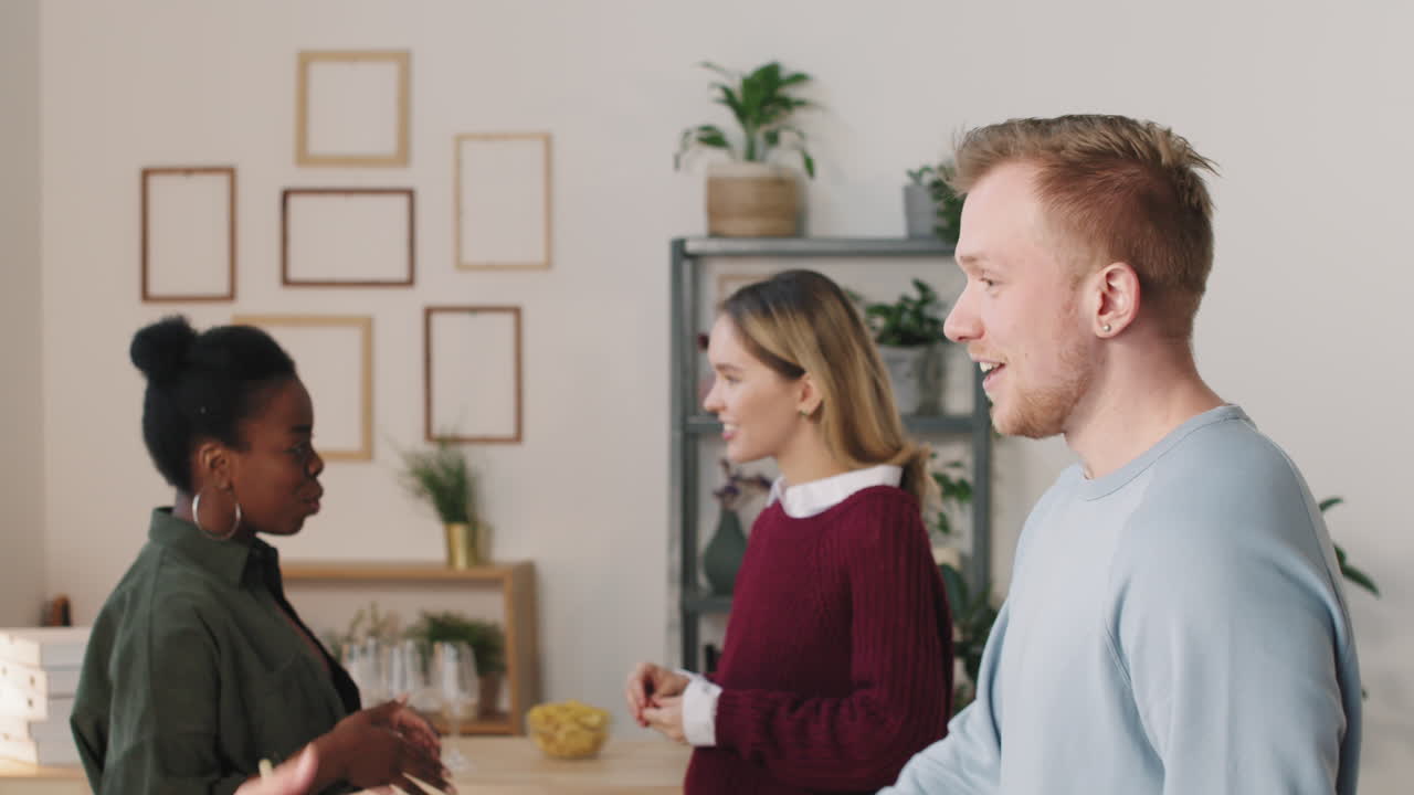 Young Men Greeting and Hugging