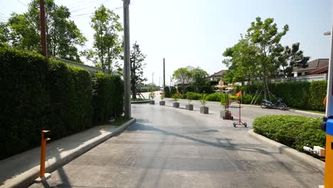 automatic gate is slowly opening for car parking lot