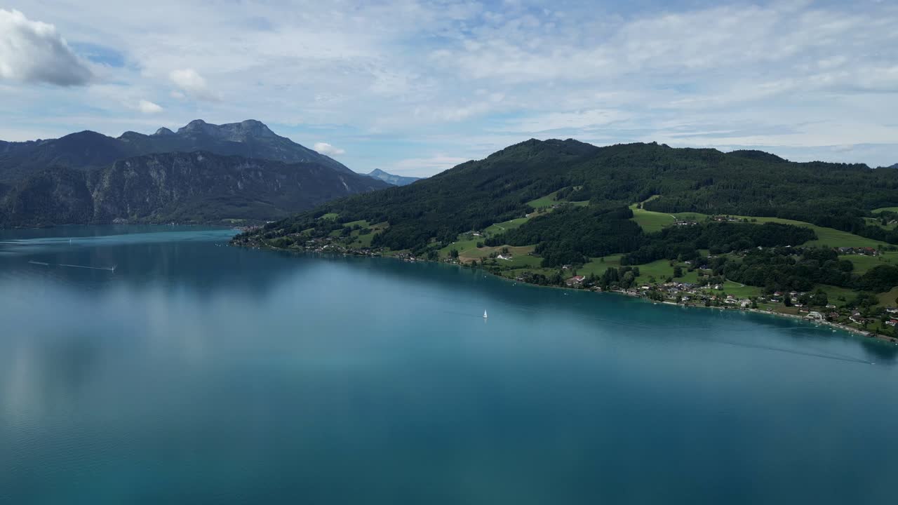 Cinematic aerial drone footage captures the pristine beauty of picturesque nature, showcasing lush landscapes, clear skies, and serene surroundings in a breathtaking, immersive experience.