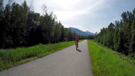 Woman-riding-unicycle-on-the-road-4k