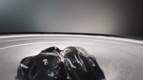 speaker with hyaluronic acid reflecting bright studio light